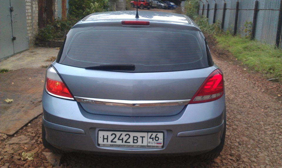 Opel astra h задняя. Задние фонари Dectane Astra h. Задние фары Опель Астра h. Опель Астра h 2006 задний фары. Опель Астра 2007 хэтчбек фары.